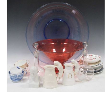 A large red glass stem bowl, a large blue glass bowl, a Copeland cat cream jug, another similar jug (unmarked), various cups,