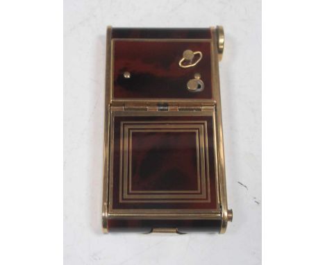 A faux wooden and brass musical compact and necessaire, 10 x 5 x 1.5cm