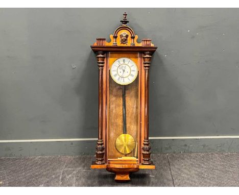 A Victorian walnut cased double weight Vienna type wall clock, approx 124 cm high, 7 inch dial