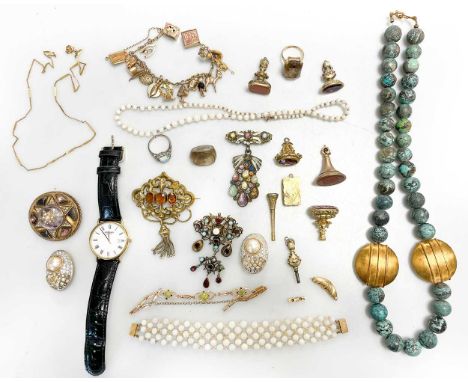 A collection of jewellery including an opal bead necklace and bracelet, an enamel brooch, a pair of costume earrings, a gold-