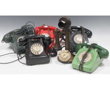 Vintage candlestick telephone handset, a black bakeletite case telephone, and 4 other old style telephones