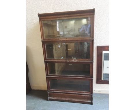 A FOUR TIER OAK GLOBE WERNICKE BOOKCASE  87cm wide 31cm deep 160cm high