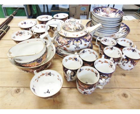 A COLLECTION OF DERBY TEAWARE C.1800  in Imari palette, including teapot and stand, slop bowl, cream jug, eight tea cups, eig