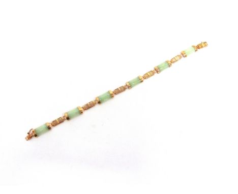A JADE BRACELET  unmarked, the six rectangular plain panels with open work character panels in between, 18.5cm long, 8g gross