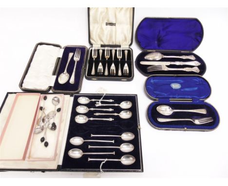 A COLLECTION OF CASED SILVER FLATWARE comprising a Victorian silver knife, fork and spoon Christening set, 1874; a set of six