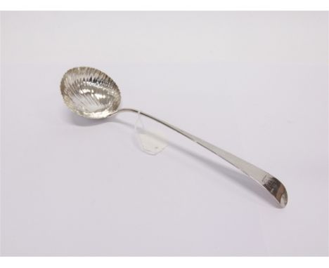 A GEORGE III SILVER SOUP LADLE maker possibly W.E. Or W.F., London 1774, Old English pattern, shell bowl, crested, 34cm long,