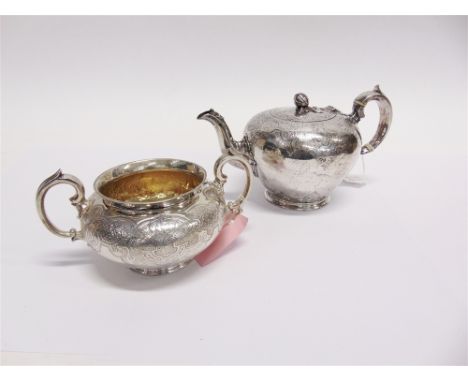 A VICTORIAN SILVER TEAPOT by Messrs Barnard, London 1841, the compressed body with engraved decoration, flush hinged cover wi