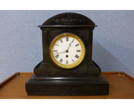 A 19th Century French Belge noir mantel clock
