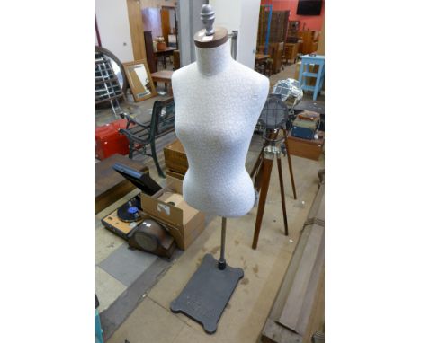 An Urban mannequin on cast iron stand