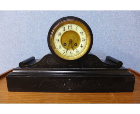 A 19th Century French Belge noir mantel clock