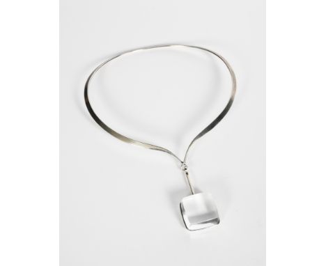 A Georg Jensen silver neck ring and rock crystal pendant designed by Vivianna Torun Bulow-Hube, model no. 169, the pendant mo