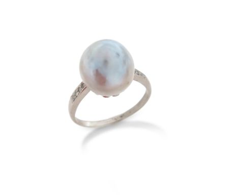 A natural pearl ring, the silver pearl set with diamonds to the shoulders in platinum, size P 1/2 Accompanied by report numbe