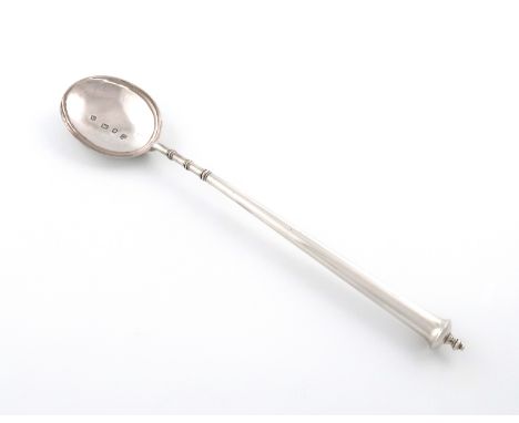 A silver cannon handled basting spoon, by R. Comyns, London 1936, tapering circular handle, with a knop finial, the reverse o