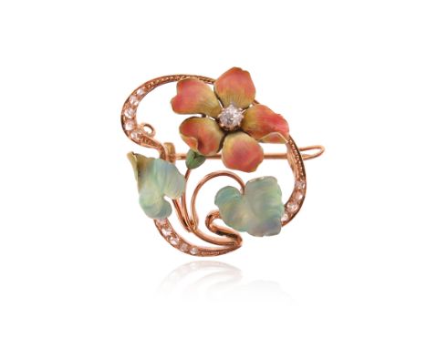 An Art Nouveau diamond-set flower brooch, centred with an old circular-cut diamond, with shaded polychrome enamel decoration,