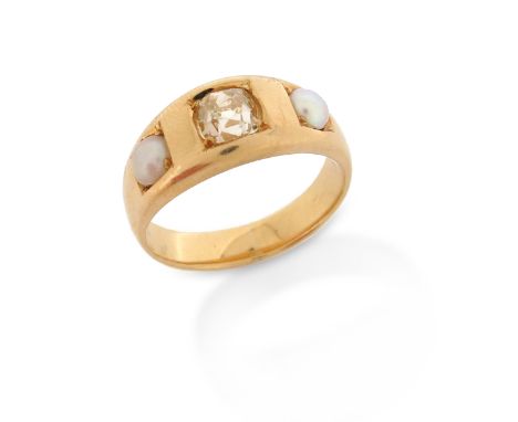 A late Victorian diamond and pearl ring, the old cushion-shaped diamond is set with two pearls in square settings on plain ye