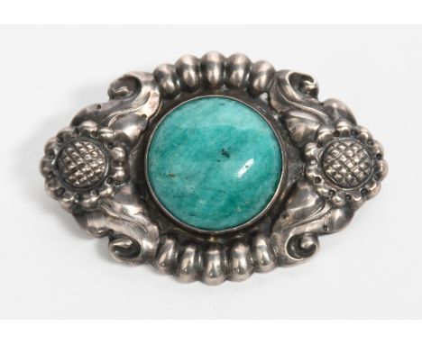 A Kay Bojesen Solvsmedie silver and Amazonite brooch, oval cast in relief with flower border, set with central Amazonite, rou