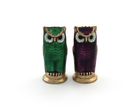 By David Andersen, a pair of Norwegian silver-gilt and enamel novelty owl pepper pots, modelled in standing positions, one wi