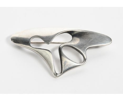 A Georg Jensen silver brooch designed by Henning Koppel, model no.325, pierced and cast abstract form, stamped factory marks,