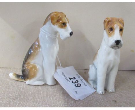 Two Royal Worcester models, seated Fox Terriers, Shape No 2942