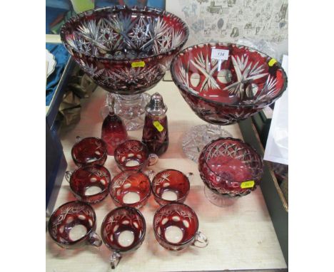 A collection of Ruby flash glass items, to include punch bowl and cups etc