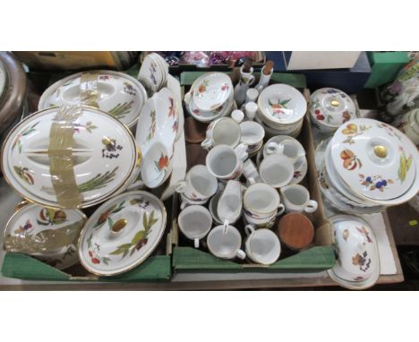 A collection of Royal Worcester Evesham pattern items, to include tureens, flan dishes, dishes, condiments, cups, saucers etc