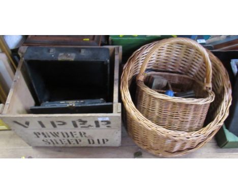 A typewriter, wooden crate, baskets etc