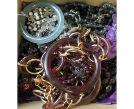 A jadeite bangle, together with various hardstone necklaces and other costume jewellery