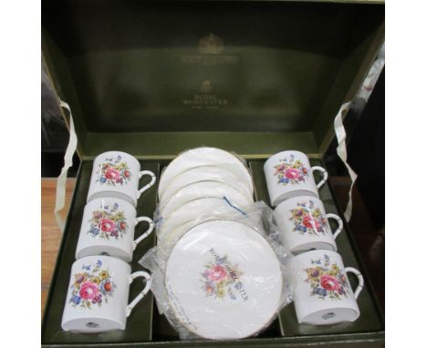 A box set of Royal Worcester coffee cans and saucers