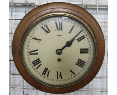 A small oak cased wall clock, overall diameter 10.5ins