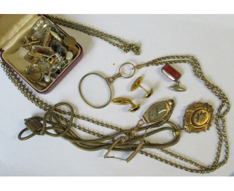 An Art Deco style wrist watch, together with a pinchbeck locket, with seed pearl and enamel decoration, a magnifying glass on