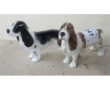 Two Royal Worcester models, of a Liver and white Spaniel and a black and white Spaniel, Shape No 3033, height 2.75ins&nbsp;