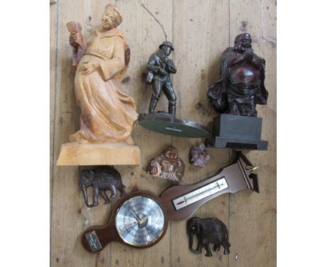 A carved wooden model, of a monk, together with a bronzed fisherman and other models, records and a barometer&nbsp;