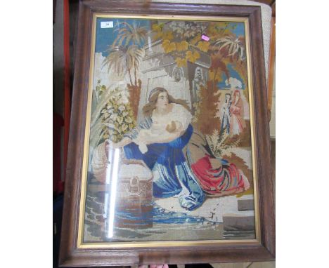 A framed tapestry picture