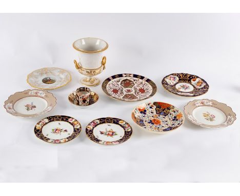 A collection of eight English porcelain plates, a Derby coffee can, saucer and a two-handled vase CONDITION REPORT: Derby vas