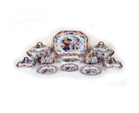 An extensive Spode New Stone dinner service, pattern 3875, decorated in the Imari palette with bowls and vases of flowers, co