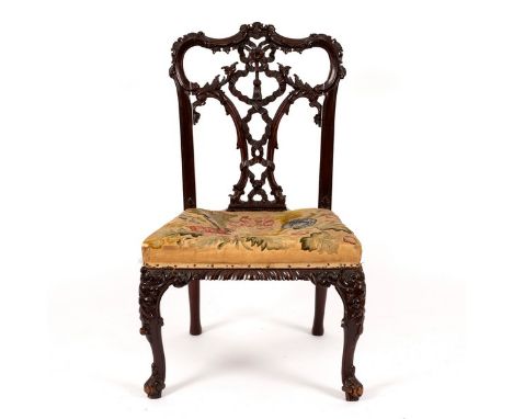 A mahogany dining chair of Chinese Chippendale style with needlework seat, on cabriole legs CONDITION REPORT: Chair is sound 