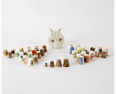 A collection of thirty-eight Royal Worcester and other thimbles, six Meadowbank coasters and a modern glass paperweight