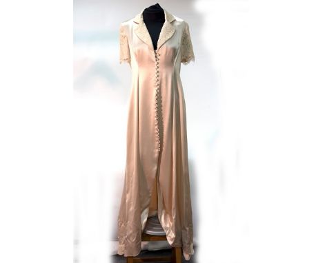 A cream satin button through long dress with lace trim, a long multi-floral, sleeveless dress and two long cotton dresses