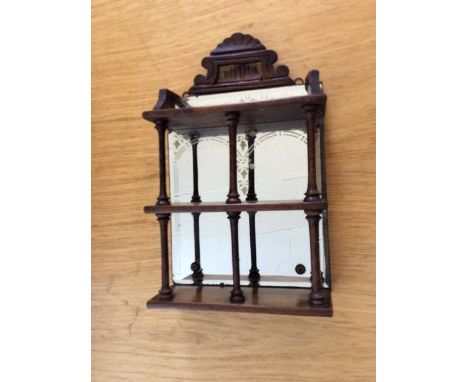 A Victorian small hanging shelf 