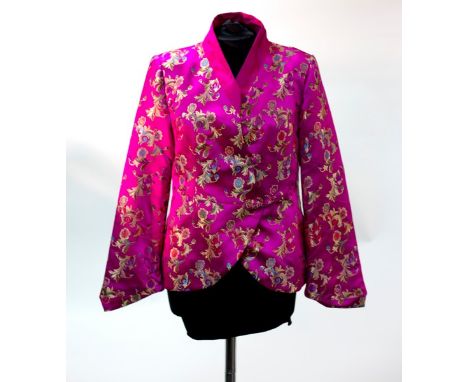 A Chinese style pink silk jacket, another in turquoise, a black taffeta cocktail dress, a black fitted jacket with floral sti