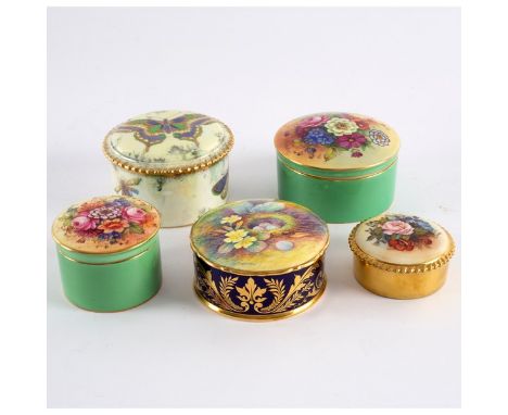 A Royal Worcester circular box and cover, decorated flowers by E Barker, 10cm diameter, a smaller example by the same and thr
