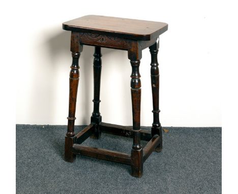 An oak stool on turned legs, 97cm high and another similar