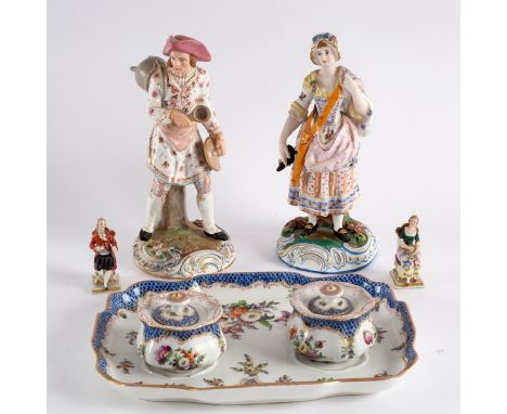 A pair of early 20th Century Continental figures, stock man with companion, 20.5cm high, a Dresden inkstand and pen tray and 