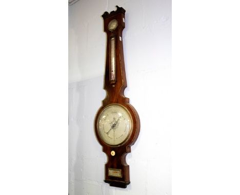 A 19th Century mahogany cased wheel barometer, with dry/damp dial above a thermometer (broken), a silvered dial with scale fr