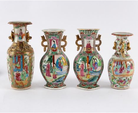 A pair of Canton famille rose flattened baluster vases, 19th Century, painted panels of figures, 23cm high, together with two