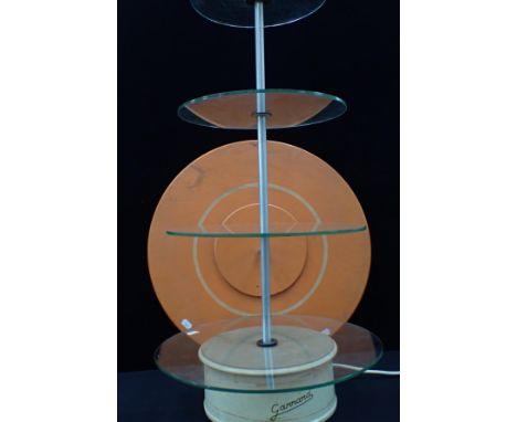 A VINTAGE GARRARD OF SWINDON SHOP DISPLAY TURNTABLE model GDT3, with graduated tiered glass shelves, and optional painted woo