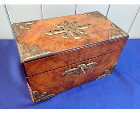 A VICTORIAN WALNUT TEA CADDY with Gothic gilt brass mounts, the hinges stamped W.T and S (William Tonks and Sons) with key (s