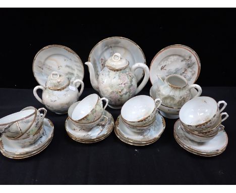 A JAPANESE EGGSHELL TEA SERVICE 
