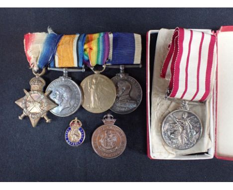 A WWI MEDAL GROUP; K.21214. J. KNIGHT. STO. R.N. with long service and good conduct medal, and other items including another 
