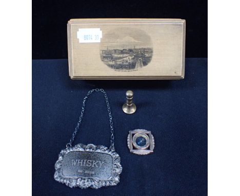 A MAUCHLINE WARE BOX WEST PIER BRIGHTON with a silver whisky label, a compass pendant in yellow metal, and a seal